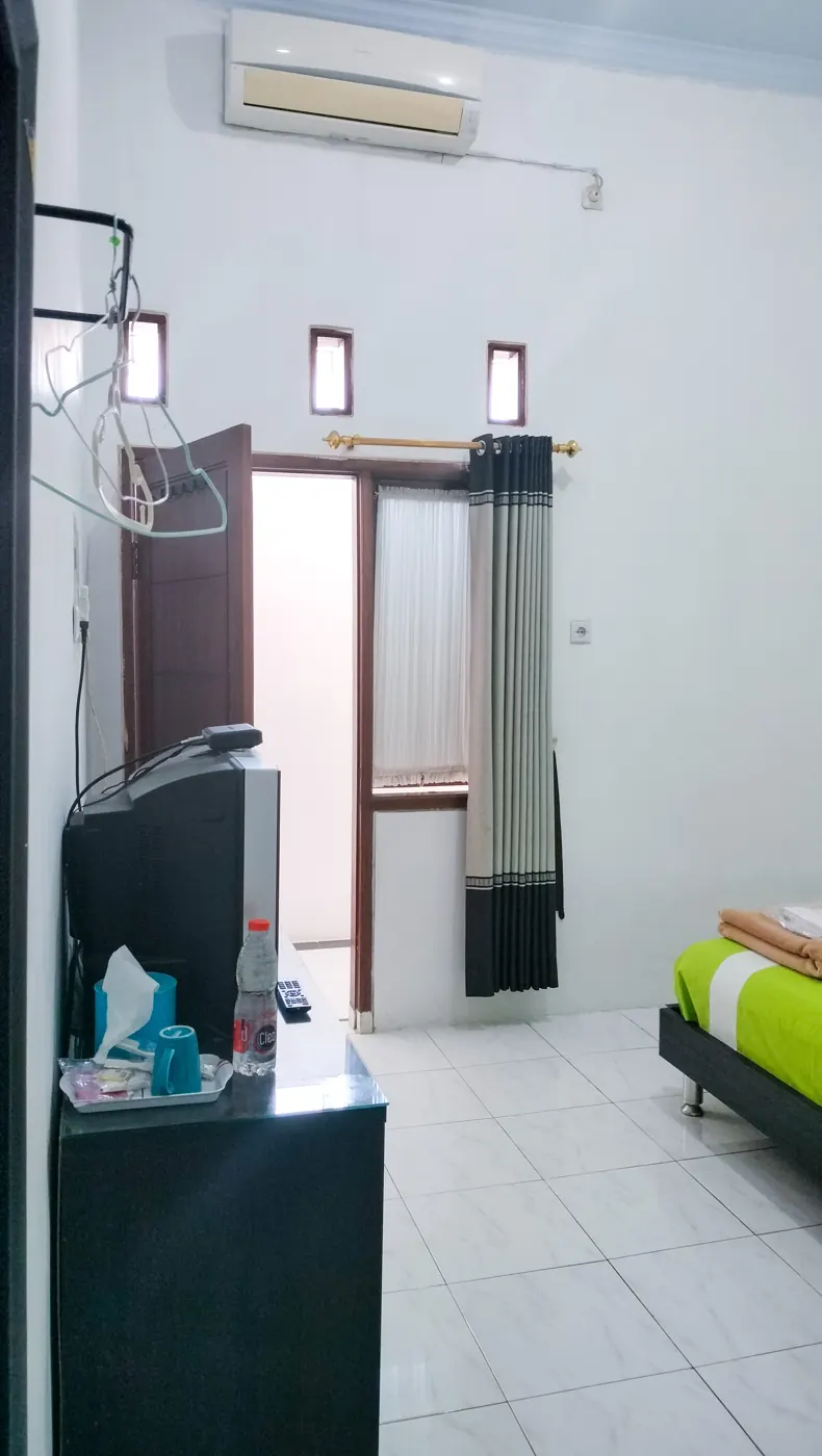 Executive Room dengan TV, AC, dan jendela
